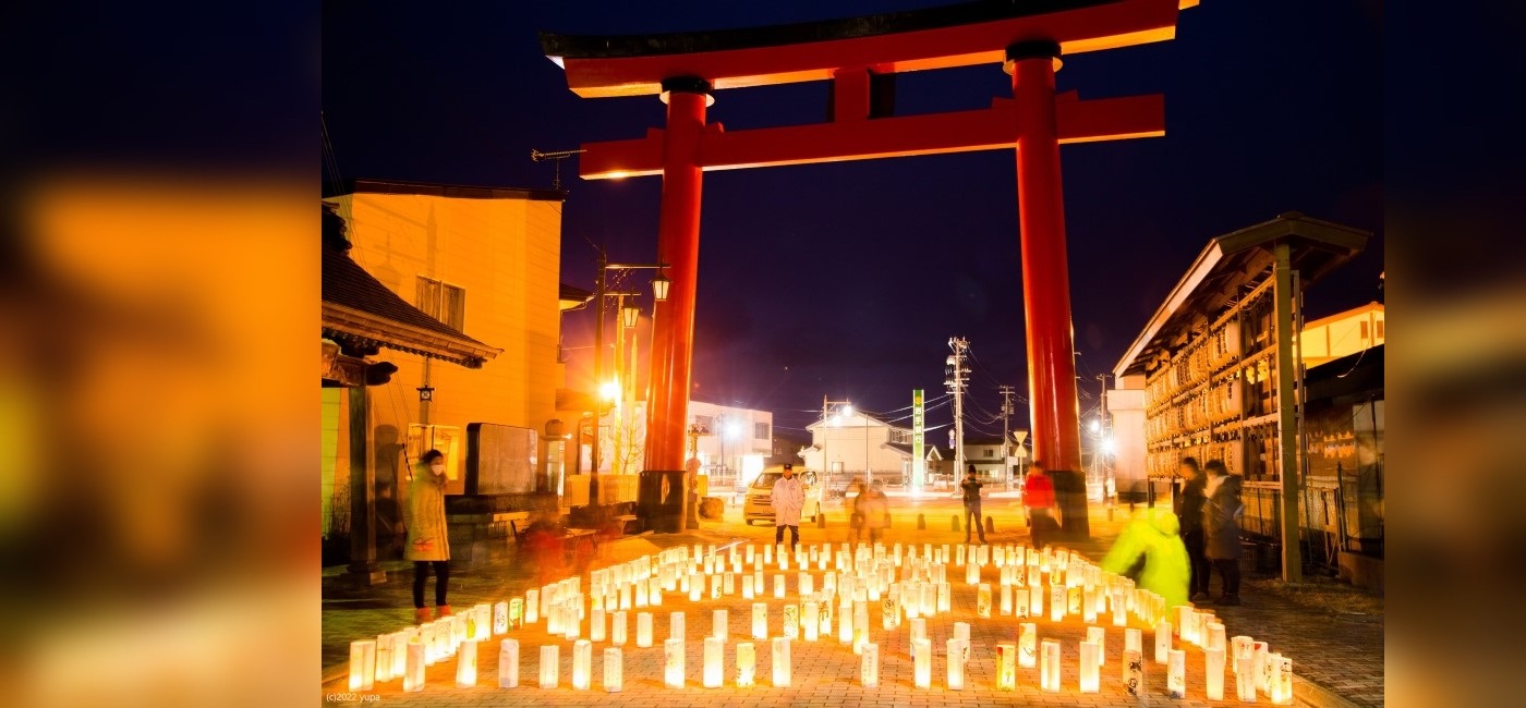 野田村フォトコンテストのグランプリ作品「夢あかり」撮影場所：愛宕参道広場、赤い鳥居の前に灯ろうがたくさんある。